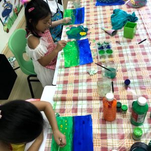 Children doing art-min
